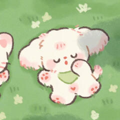 A cute little puppy with their cute little cat friend laying on the flower filled grass and cloud watching